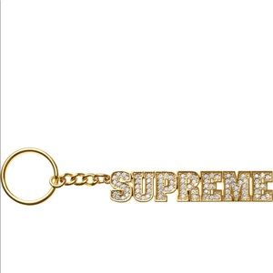 Gold supreme key chain